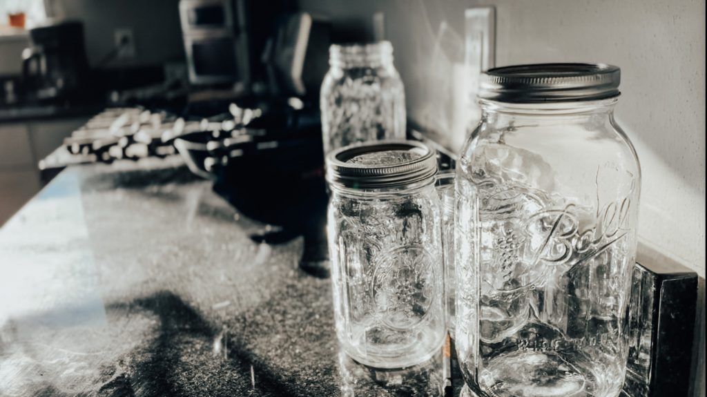 Mason jars on the counter 

