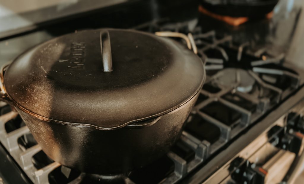 cast iron dutch oven cookware on stove