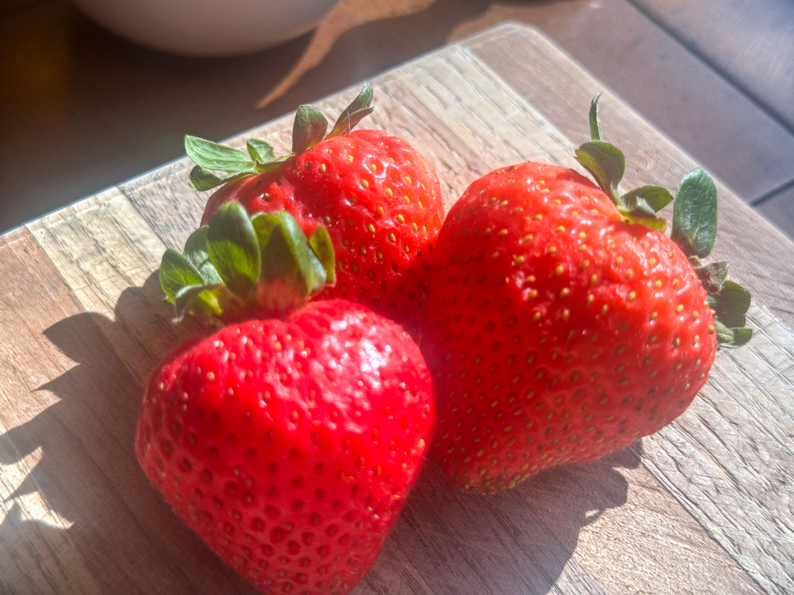 Three big red strawberries